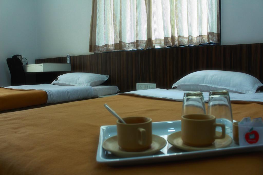 ناسيك Aashiyana Inn المظهر الخارجي الصورة